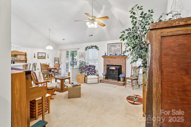 11100 Scrimshaw Ln, Charlotte, NC 28215 - living room featuring carpet floors, ceiling fan, a fireplace, and high vaulted ceiling