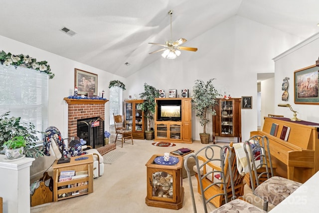 11100 Scrimshaw Ln, Charlotte, NC 28215 - living area with ceiling fan, plenty of natural light, a fireplace, carpet, and high vaulted ceiling