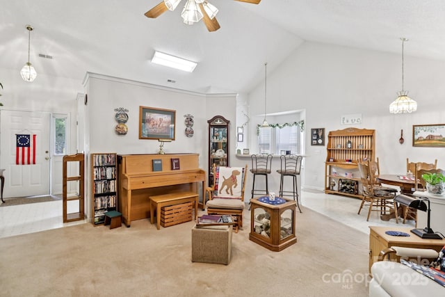 11100 Scrimshaw Ln, Charlotte, NC 28215 - carpeted living room featuring a ceiling fan, healthy amount of natural light, and high vaulted ceiling