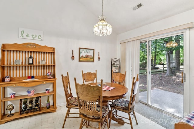 11100 Scrimshaw Ln, Charlotte, NC 28215 - dining space with a chandelier, vaulted ceiling, and light flooring
