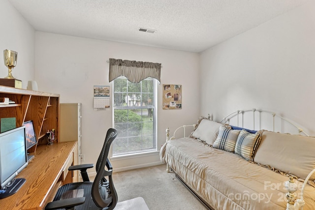 11100 Scrimshaw Ln, Charlotte, NC 28215 - bedroom featuring carpet, an office area, and a textured ceiling