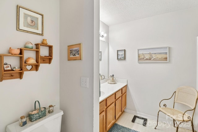 11100 Scrimshaw Ln, Charlotte, NC 28215 - bathroom featuring vanity and a textured ceiling