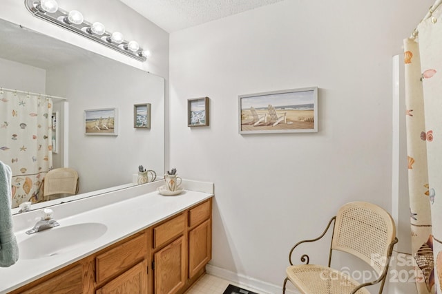 11100 Scrimshaw Ln, Charlotte, NC 28215 - bathroom featuring vanity, a shower with shower curtain, and a textured ceiling