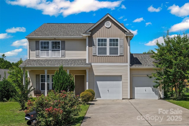 1287 Century Dr, Clover, SC 29710 - traditional-style house with concrete driveway, board and batten siding, a shingled roof, covered porch, and a garage