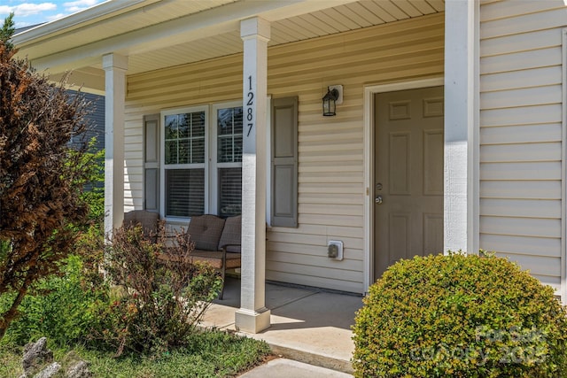 1287 Century Dr, Clover, SC 29710 - doorway to property featuring a porch