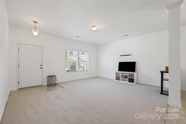 1287 Century Dr, Clover, SC 29710 - unfurnished living room with light colored carpet and baseboards