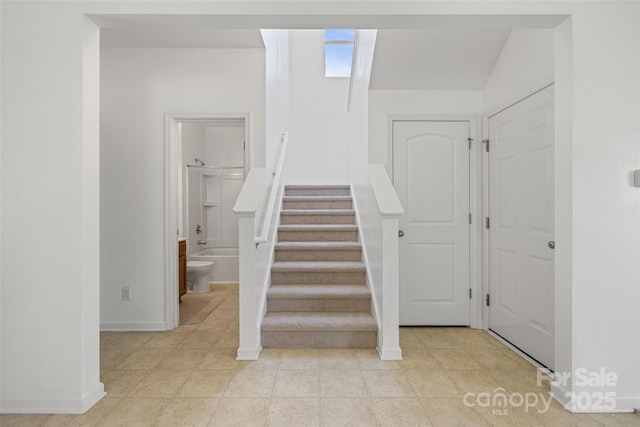 1287 Century Dr, Clover, SC 29710 - stairway with baseboards and tile patterned flooring