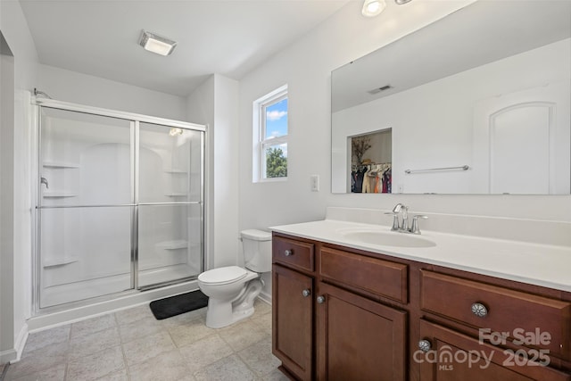 1287 Century Dr, Clover, SC 29710 - full bathroom with vanity, a shower stall, and a spacious closet