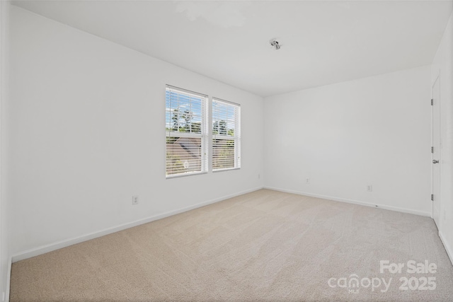1287 Century Dr, Clover, SC 29710 - unfurnished room with baseboards and light carpet