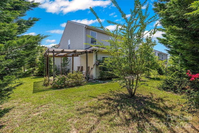 1287 Century Dr, Clover, SC 29710 - rear view of house featuring a pergola and a yard