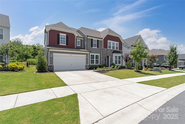 2225 Masons Bend Dr, Fort Mill, SC 29708 - view of front of home featuring stone siding, concrete driveway, an attached garage, and a residential view