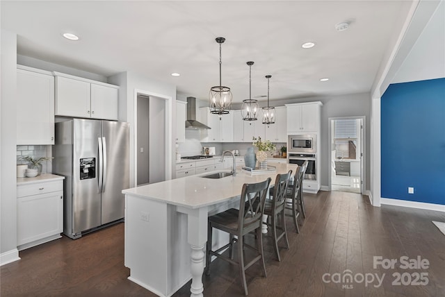 2225 Masons Bend Dr, Fort Mill, SC 29708 - kitchen with stainless steel appliances, wall chimney exhaust hood, backsplash, recessed lighting, and white cabinetry