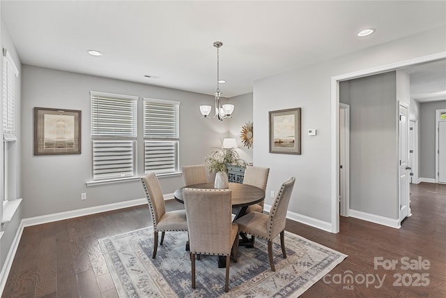 2225 Masons Bend Dr, Fort Mill, SC 29708 - dining area with a chandelier, dark wood-style floors, recessed lighting, and healthy amount of natural light