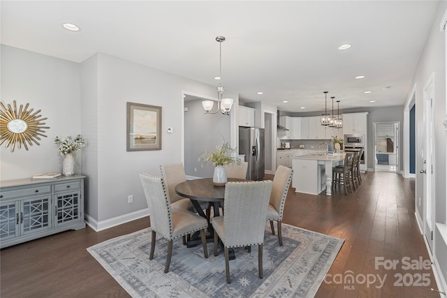 2225 Masons Bend Dr, Fort Mill, SC 29708 - dining area with a chandelier, dark wood-style flooring, and recessed lighting