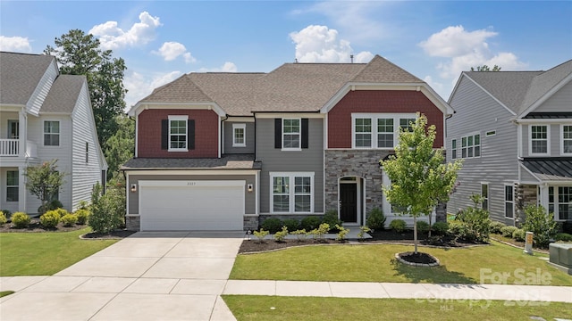 2225 Masons Bend Dr, Fort Mill, SC 29708 - view of front of home with stone siding, driveway, a garage, and a front yard