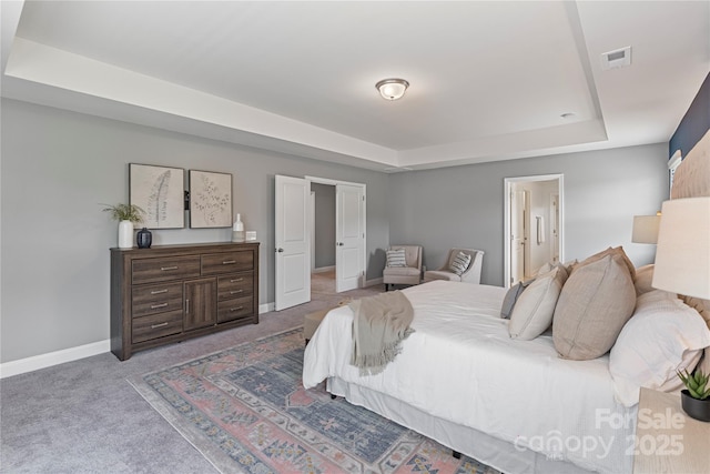 2225 Masons Bend Dr, Fort Mill, SC 29708 - carpeted bedroom with a tray ceiling and ensuite bathroom