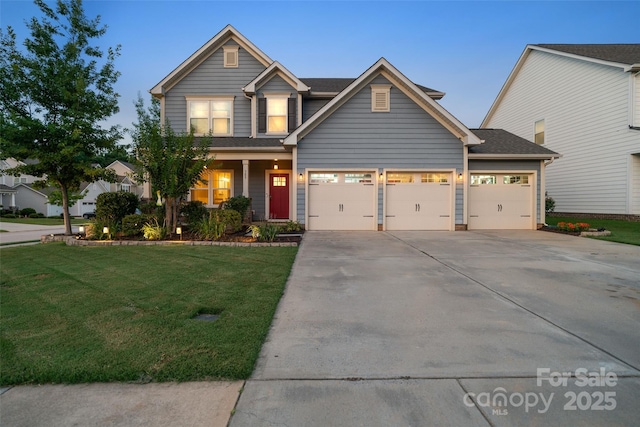 305 Redberry Ct, York, SC 29745 - view of front of home with driveway, a front lawn, and a garage
