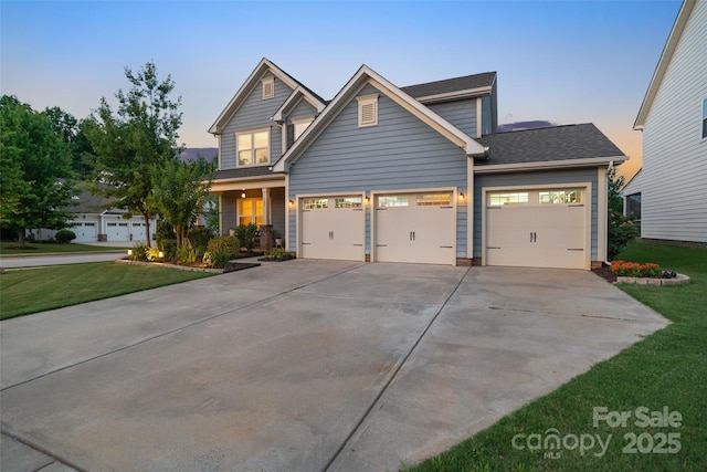 305 Redberry Ct, York, SC 29745 - view of front facade featuring concrete driveway, a garage, a front lawn, and roof with shingles