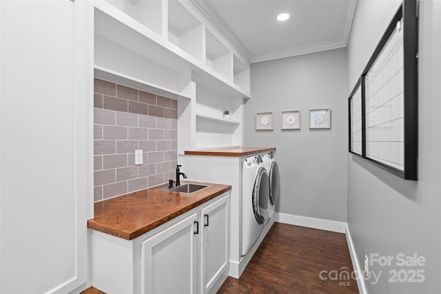 305 Redberry Ct, York, SC 29745 - laundry area with separate washer and dryer, crown molding, dark wood finished floors, cabinet space, and recessed lighting