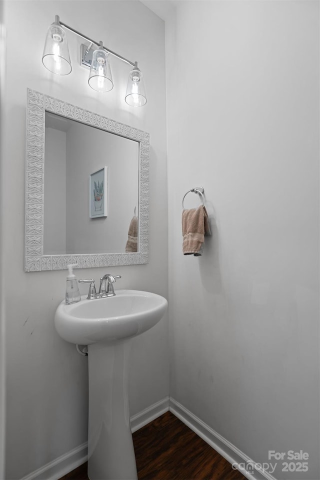 305 Redberry Ct, York, SC 29745 - bathroom featuring baseboards and wood finished floors