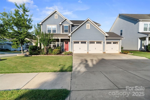 305 Redberry Ct, York, SC 29745 - view of front of house featuring a front yard, concrete driveway, and an attached garage