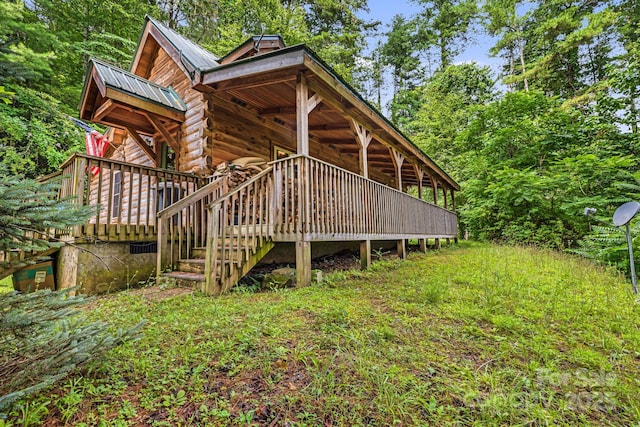 41 Waya Way, Whittier, NC 28789 - view of property exterior with a metal roof and a deck