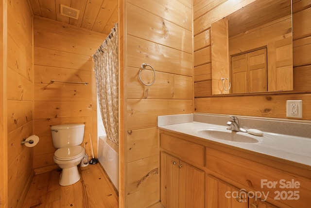 41 Waya Way, Whittier, NC 28789 - bathroom featuring vanity, wood walls, wood finished floors, shower / bath combination with curtain, and wooden ceiling