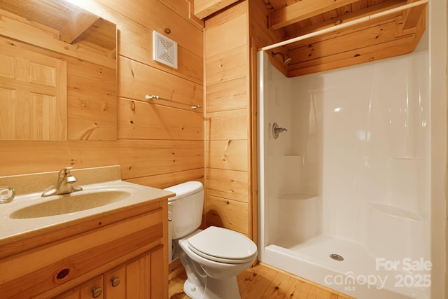 41 Waya Way, Whittier, NC 28789 - bathroom with a shower stall, vanity, wood walls, and wood finished floors