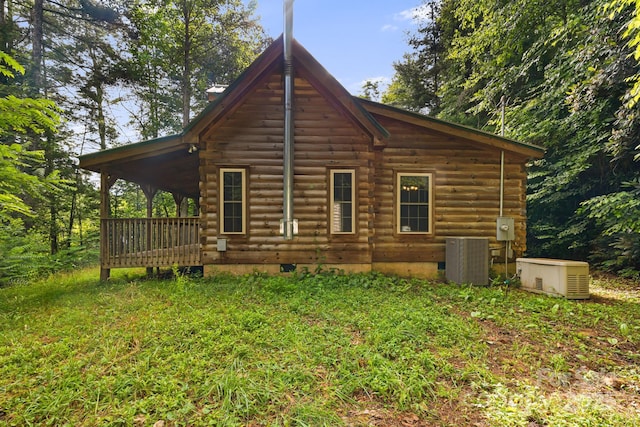 41 Waya Way, Whittier, NC 28789 - rear view of house with log exterior and a wooden deck