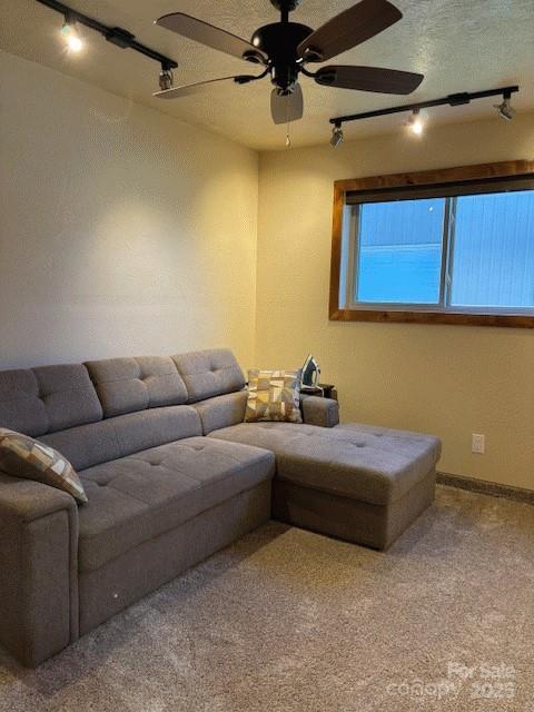 535 Lafayette Pl, Carthage, NC 28327 - cinema room with track lighting, a ceiling fan, and carpet floors
