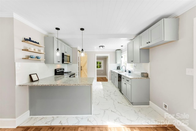 410 Gann St, Lowell, NC 28098 - kitchen featuring appliances with stainless steel finishes, light marble finish flooring, light stone counters, a peninsula, and open shelves