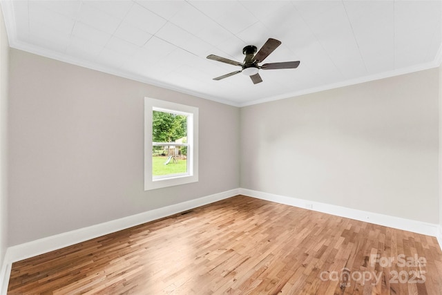 410 Gann St, Lowell, NC 28098 - spare room with wood finished floors, crown molding, and a ceiling fan