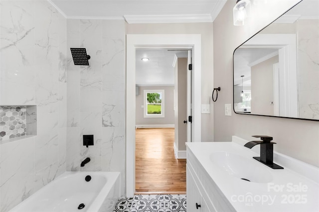 410 Gann St, Lowell, NC 28098 - bathroom with crown molding, vanity, shower / bathtub combination, and wood finished floors