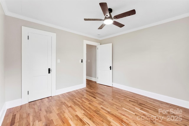 410 Gann St, Lowell, NC 28098 - unfurnished bedroom with light wood-style flooring, crown molding, and ceiling fan