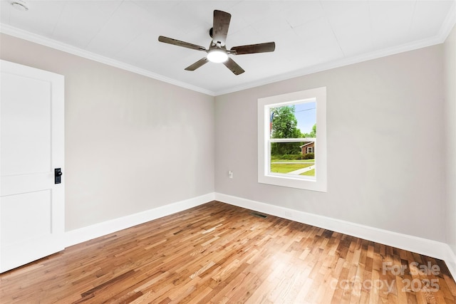 410 Gann St, Lowell, NC 28098 - spare room featuring hardwood / wood-style floors, ornamental molding, and a ceiling fan