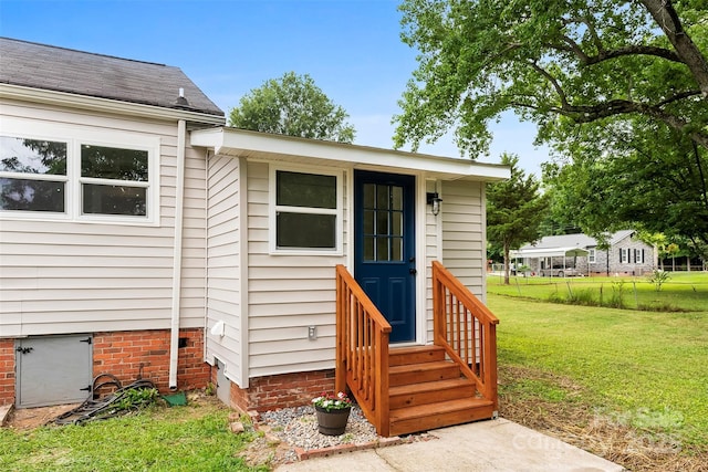 410 Gann St, Lowell, NC 28098 - property entrance with a shingled roof