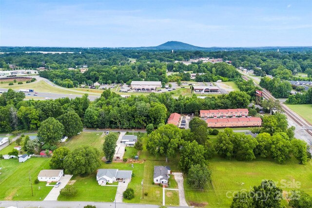 410 Gann St, Lowell, NC 28098 - aerial view of a tree filled landscape