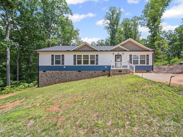 601 Lhasa Apso Ln, Iron Station, NC 28080 - ranch-style house featuring crawl space and a front lawn