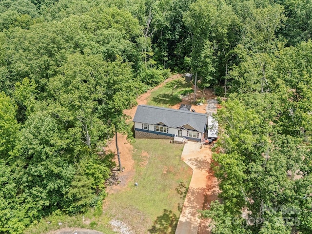 601 Lhasa Apso Ln, Iron Station, NC 28080 - view from above of property with a heavily wooded area