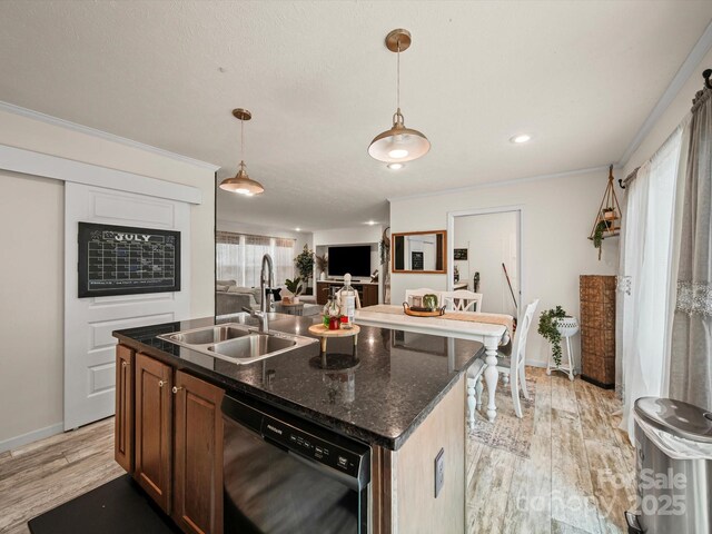 601 Lhasa Apso Ln, Iron Station, NC 28080 - kitchen featuring dishwasher, light wood-style flooring, open floor plan, decorative light fixtures, and ornamental molding