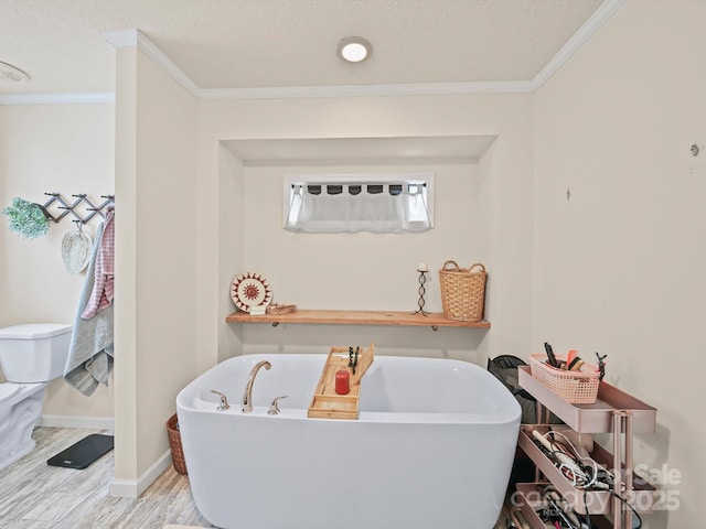 601 Lhasa Apso Ln, Iron Station, NC 28080 - full bathroom with ornamental molding, a soaking tub, and wood finished floors