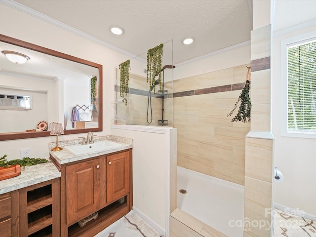 601 Lhasa Apso Ln, Iron Station, NC 28080 - full bathroom with vanity, walk in shower, plenty of natural light, crown molding, and a textured ceiling