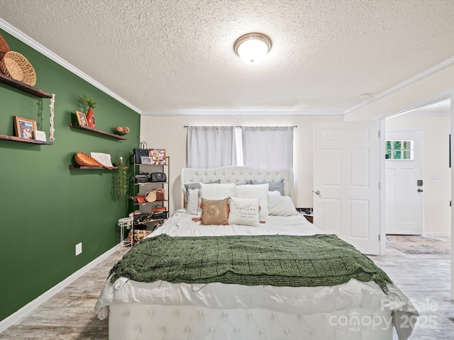 601 Lhasa Apso Ln, Iron Station, NC 28080 - bedroom featuring ornamental molding, wood finished floors, and a textured ceiling