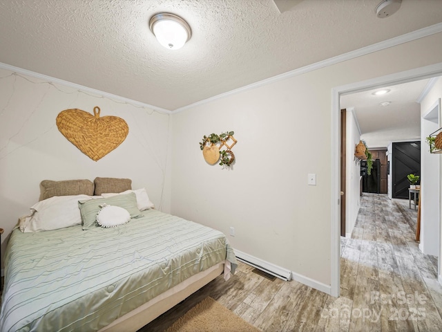 601 Lhasa Apso Ln, Iron Station, NC 28080 - bedroom featuring wood finished floors, crown molding, and a textured ceiling