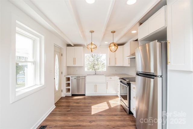678 Wagner St, Troutman, NC 28166 - kitchen featuring stainless steel appliances, tasteful backsplash, white cabinetry, under cabinet range hood, and dark wood-type flooring