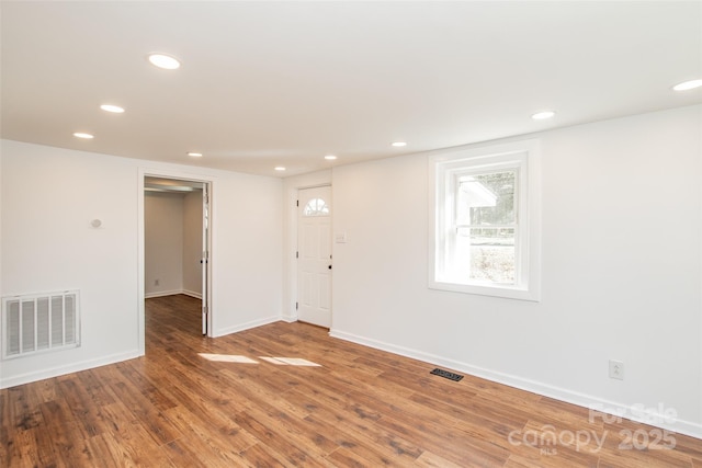 678 Wagner St, Troutman, NC 28166 - spare room with recessed lighting and wood finished floors