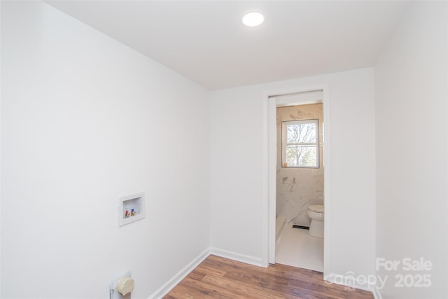 678 Wagner St, Troutman, NC 28166 - laundry area featuring washer hookup and wood finished floors