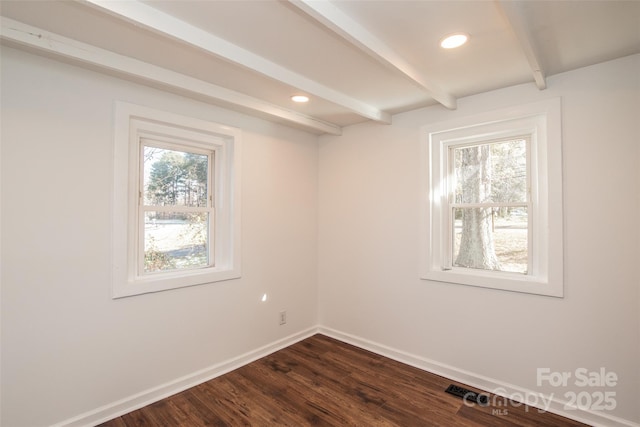 678 Wagner St, Troutman, NC 28166 - empty room with beam ceiling, dark wood-style floors, and recessed lighting
