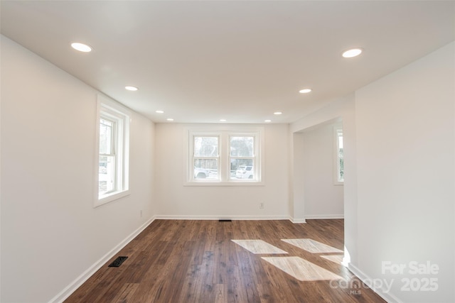 678 Wagner St, Troutman, NC 28166 - unfurnished room featuring dark wood finished floors and recessed lighting