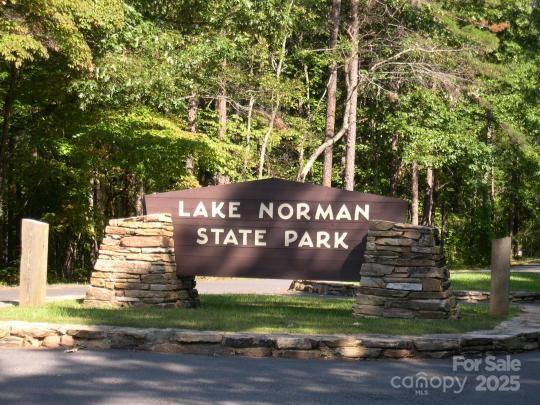 678 Wagner St, Troutman, NC 28166 - community / neighborhood sign with a forest view